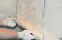 Сплошное выравнивание поверхностей стен сухими гипсовыми растворным