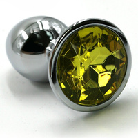 Маленькая алюминиевая анальная пробка Kanikule Small с кристаллом – серебристый с желтым Beauty Brands Limited