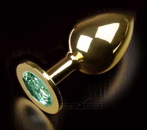 Большая анальная пробка 252 Large Gold Emerald с кристаллом – золотой с зеленым Пикантные Штучки